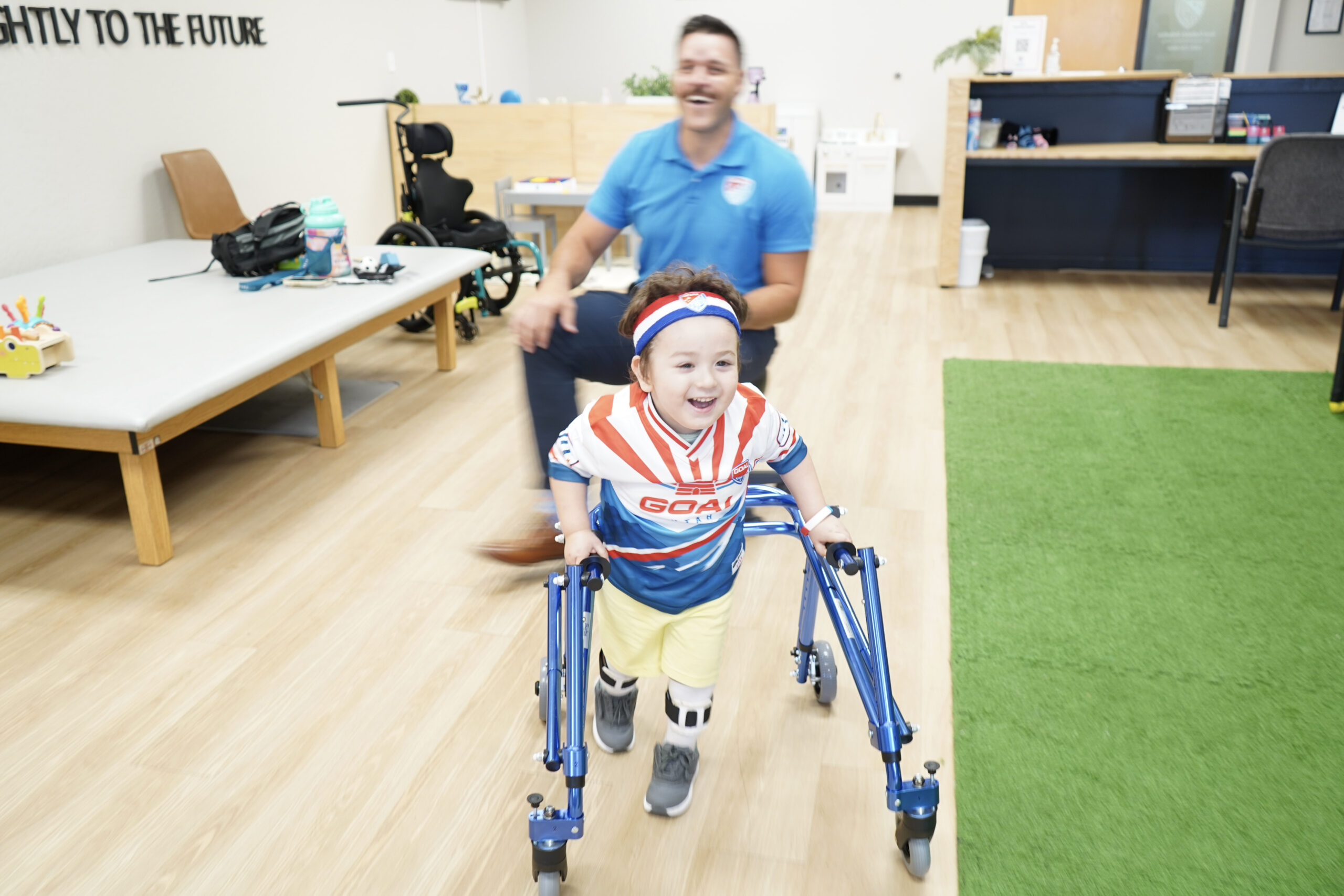 Kid happily walking with leg braces